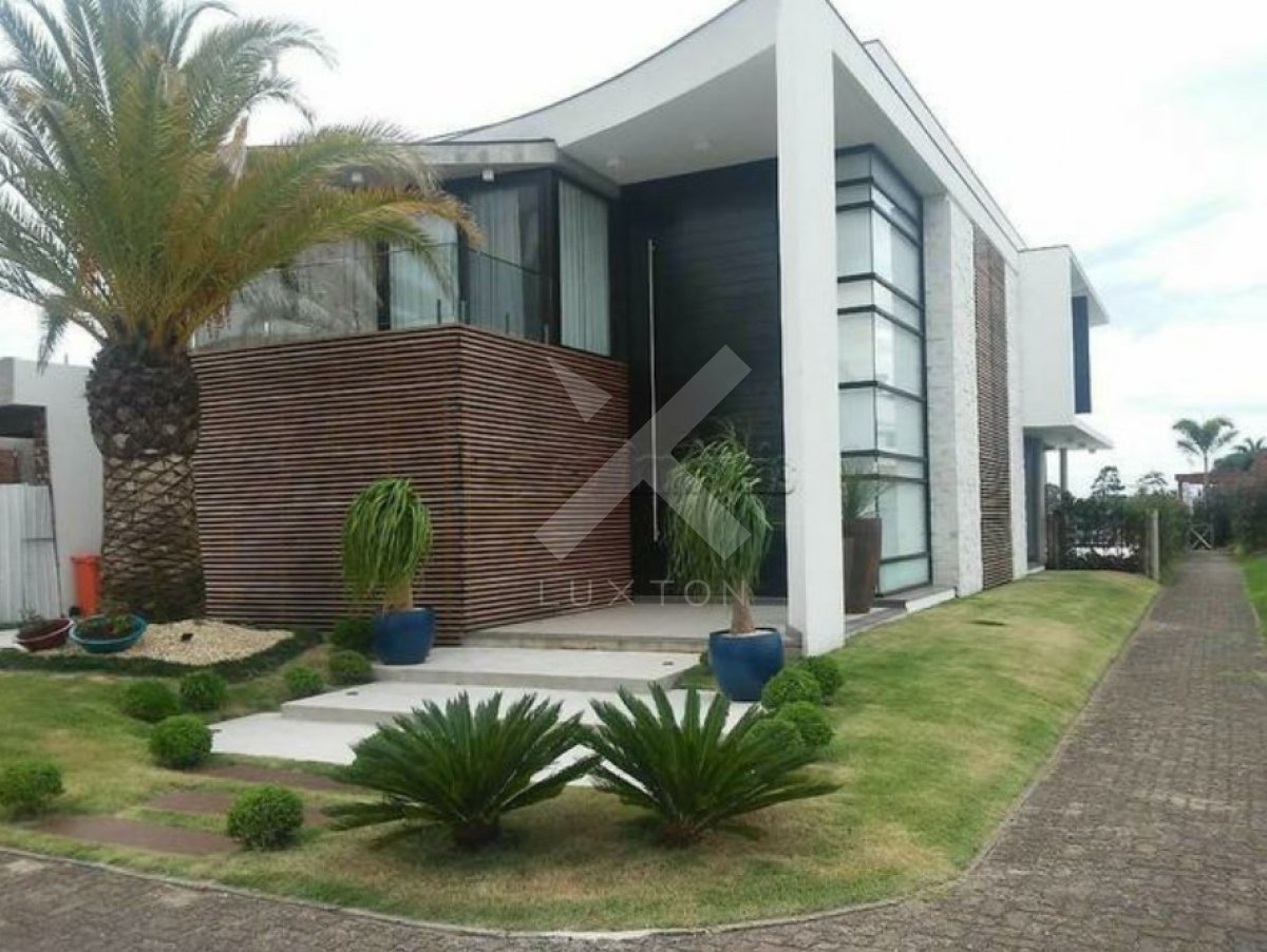 Casa em Condominio com 400m², 6 dormitórios, 6 suítes, 2 vagas, no bairro Zona Nova em Capão da Canoa para Comprar