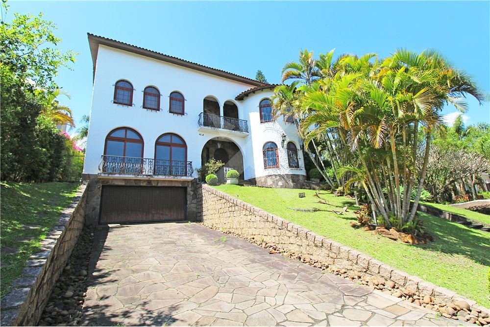 Casa em Condominio com 552m², 4 dormitórios, 3 suítes, 4 vagas, no bairro Cavalhada em Porto Alegre para Comprar