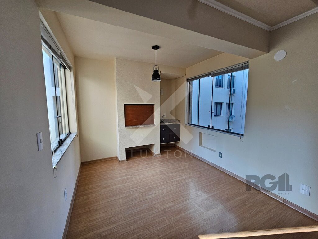 Apartamento com 70m², 2 dormitórios, 1 vaga, no bairro Auxiliadora em Porto Alegre para Comprar