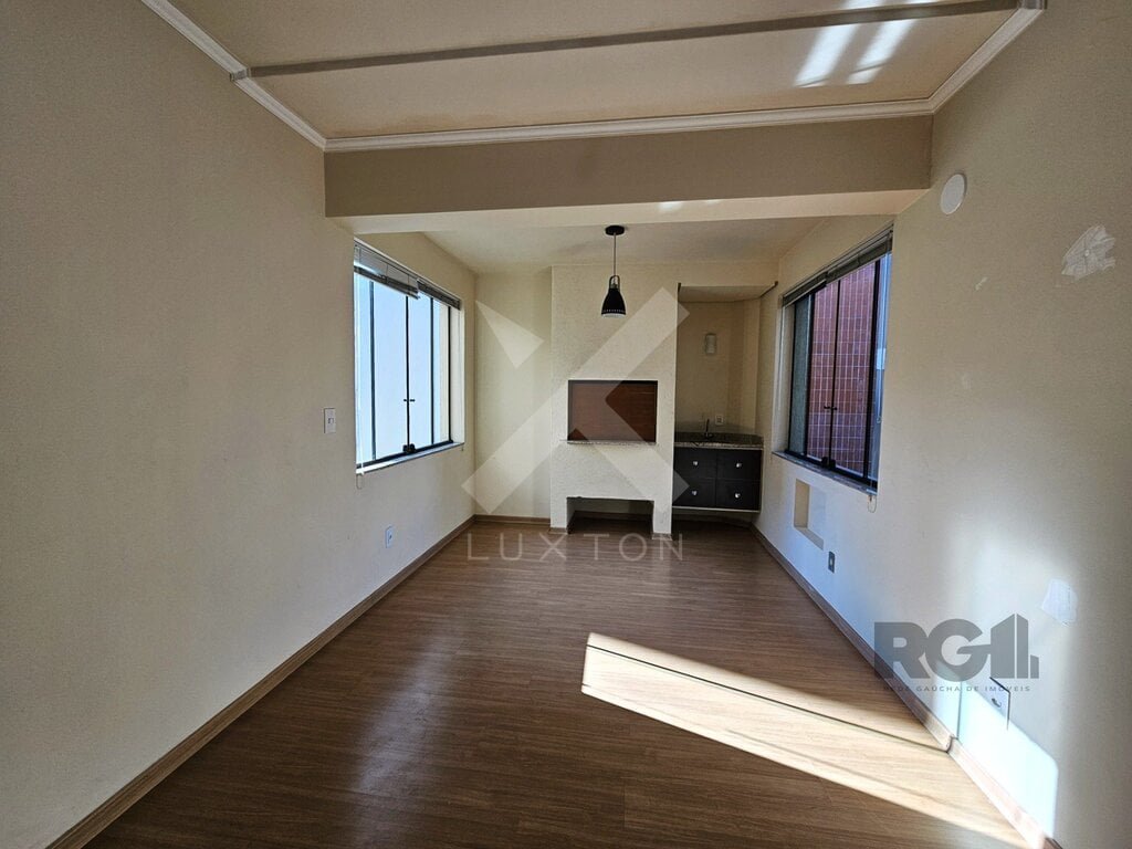 Apartamento com 70m², 2 dormitórios, 1 vaga, no bairro Auxiliadora em Porto Alegre para Comprar