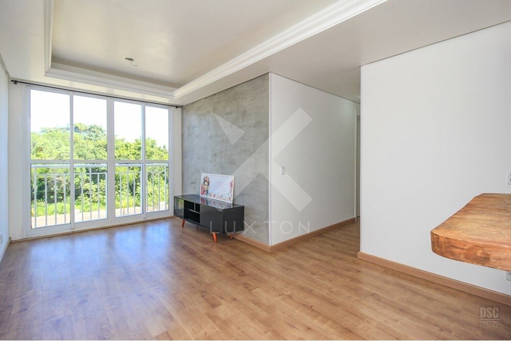 Apartamento com 58m², 2 dormitórios, 1 suíte, 1 vaga, no bairro Vila Nova em Porto Alegre para Comprar